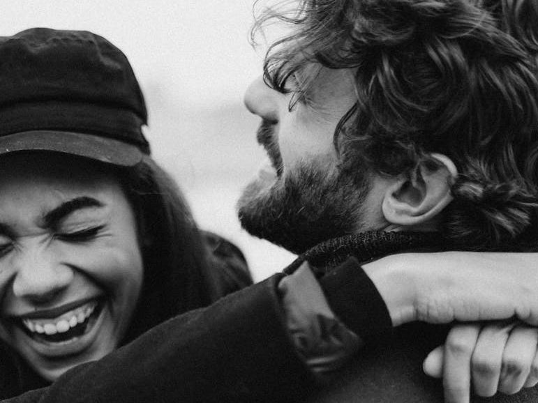 Couple reconnecting and laughing together